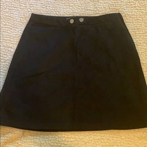 Cute black mini skirt.